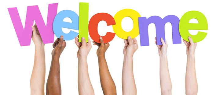 Welcome-letters-held-up-by-different-hands1.jpg