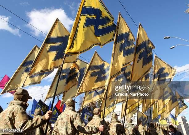 ba542b00-6ca4-4a1a-9d70-95867bda4165-members-of-the-azov-regiment-take-part-in-a-march-to-the-78th-anniversary-of-the-founding-827011667.jpg